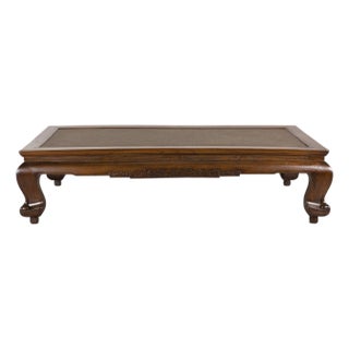 Antique Chinese Elm Opium Bed Coffee Table with Woven Rattan Top and Scroll Legs For Sale