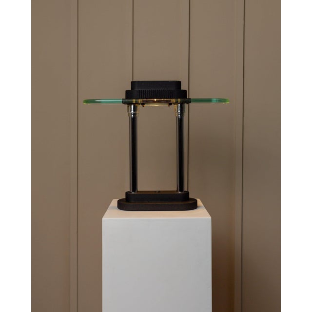 This elegant table/desk lamp with the model name 'Bankers' was designed by Robert Sonneman for Georges Kovacs and...