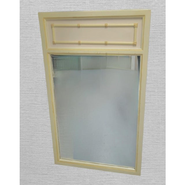 A beautiful vintage faux bamboo nightstand. The night stand features 2 drawers with pretty bamboo details. The nightstand...