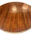 A distinguished late 19th century English pedestal table featuring a richly figured circular wood top accented with...