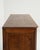 A refined example of the Louis XV style, this early 19th-century French chest of drawers carries the graceful serpentine...