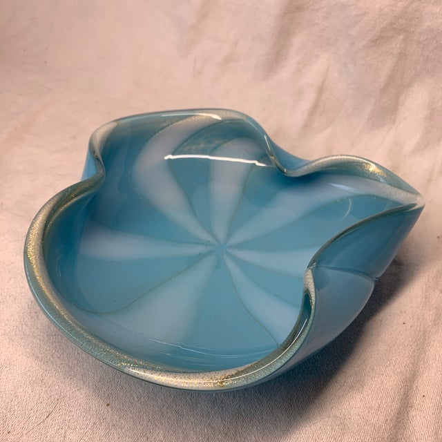This mid-century Italian Alfredo Barbini Murano "Circus Tent" art glass bowl features a beautiful turquoise-blue and white...