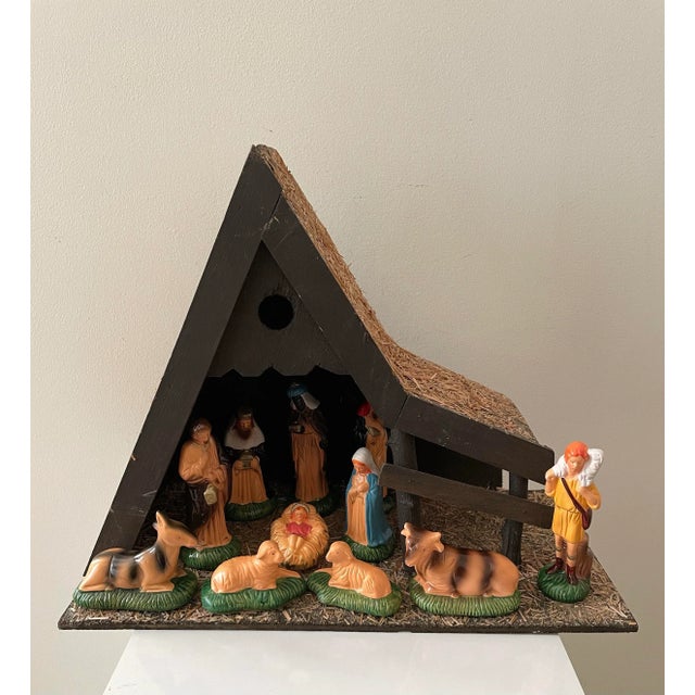 Mid-Century A-Frame Nativity Scene with Hand-Painted Figures This charming vintage nativity set captures the warmth of the...