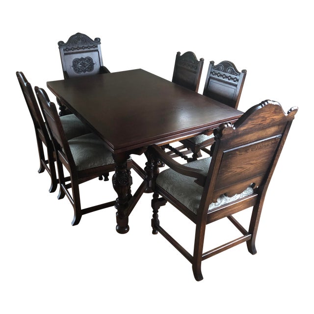 Early 20th Century Jacobean Style Carved Oak Dining Room Set with