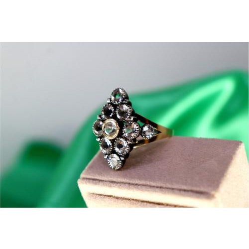 Gold and Silver Ring with Inlaid Zirconias, in Very Good conditions. Designed 1980 to 1989 This piece has an attribution...