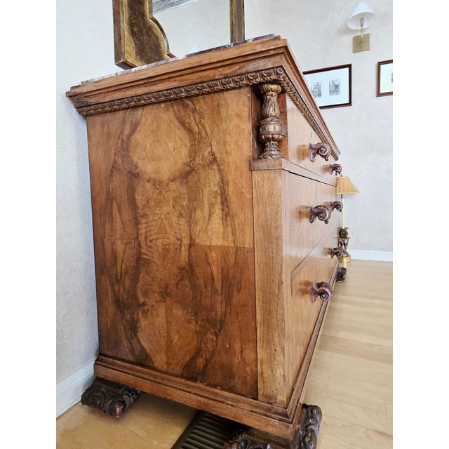 This striking French commode is thought to date to the mid-1800's and is designed in the Louis Philippe style. It features...