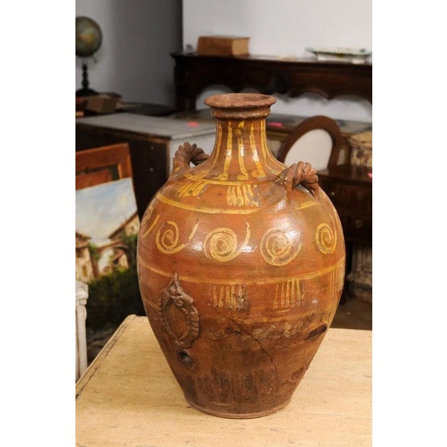 17th Century Italian Terracotta Olive Oil Jar with Yellow Glazed Spiraling Décor For Sale - Image 11 of 13