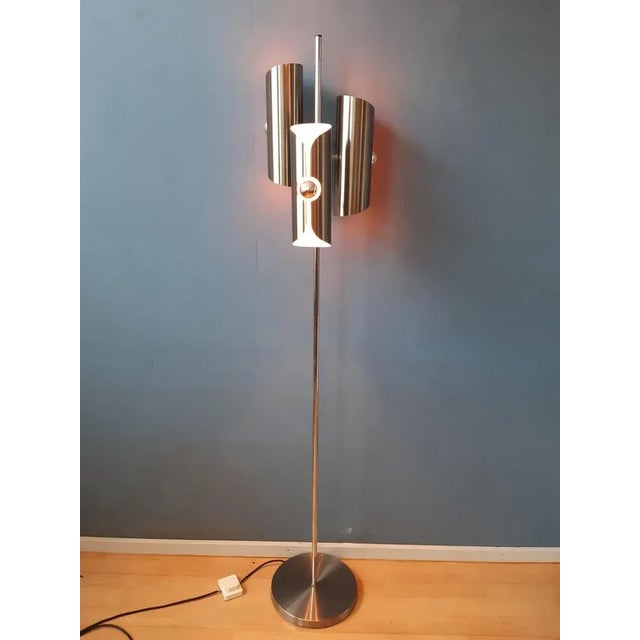A very rare space age floorlamp often attributed to Raak but produced by the Polish company Polam. The floorlamp has a...