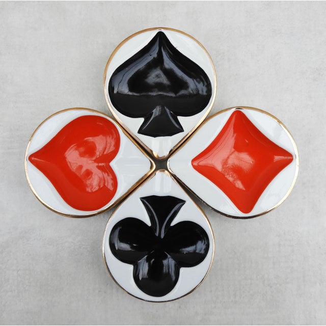 Charming set of 4 vintage playing card-themed trinket dishes/ashtrays from Poland, circa 1960. Four gilded porcelain...