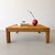 This vintage 1970s square coffee table features an architectural pencil reed rattan construction with a beautifully...