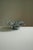 Nénuphar I Sculptural Ceramic Piece by Antonia Maria One of a Kind. Dimensions: Ø 32 x H 18 cm. Materials: Ceramic, grey...