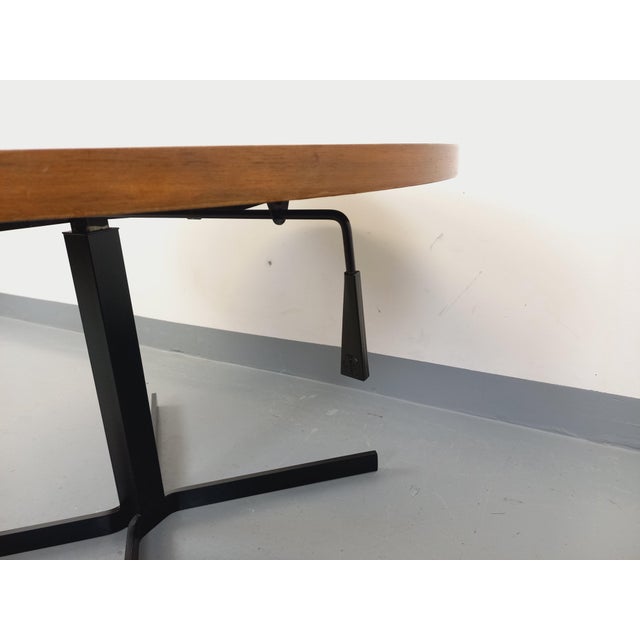 Large round vintage Scandinavian-style coffee table from the 1960s, attributed to the German brand Ilse Möbel. Known as...