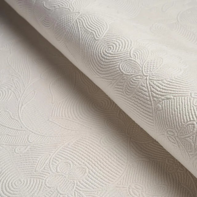 A delicate design derived from a fragment of an 18th-century bedcover, Quilted Scroll Matelassé is made of 100% cotton....