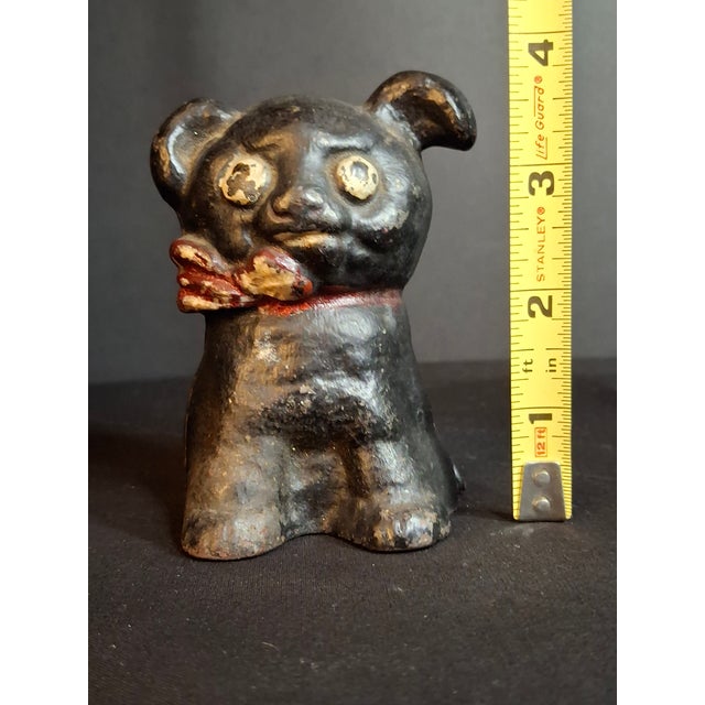 Offered here is an original early 20th-century cast iron "Fido" sitting dog still bank by the Hubley Manufacturing Company...