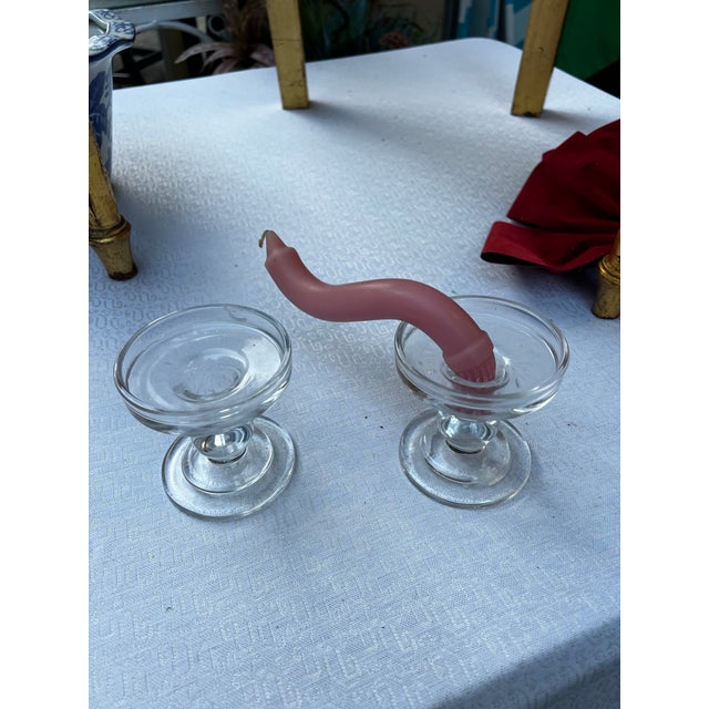 Up for consideration is a beautiful vintage pair of glass champagne style candlestick holders. These would look lovely in...