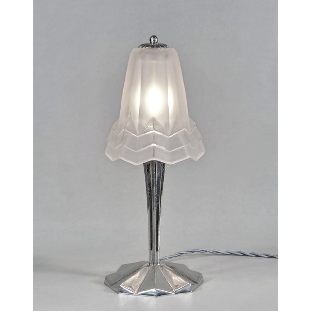 Degué A beautiful French modernist art deco table lamp made around 1930. The nickel-plated base in solid brass or bronze...