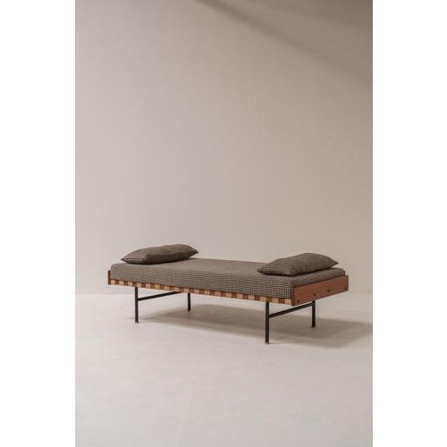 This elegant daybed was designed by italian architect and designer edoardo gellner around 1970 and perfectly reflects the...