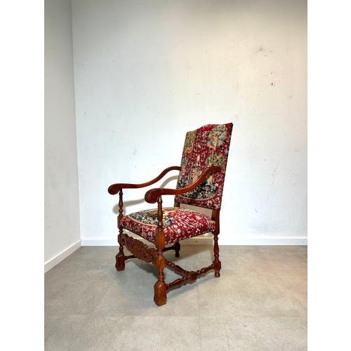 A stunning antique armchair upholstered in a richly woven tapestry inspired by the lady and the unicorn, one of the most...