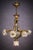 Important antique gilt bronze chandelier, adorned with opaline glass shells and flowers, Art Nouveau period The body is...