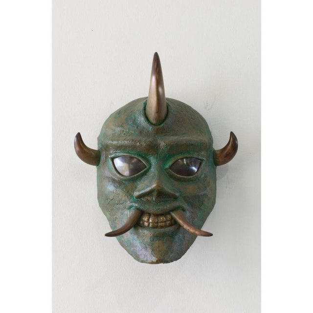 Bronze oni mask #2 by splady art studios design by alexander yoshikawa dimensions: w 10 x d 20 x h 27 cm. Materials:...