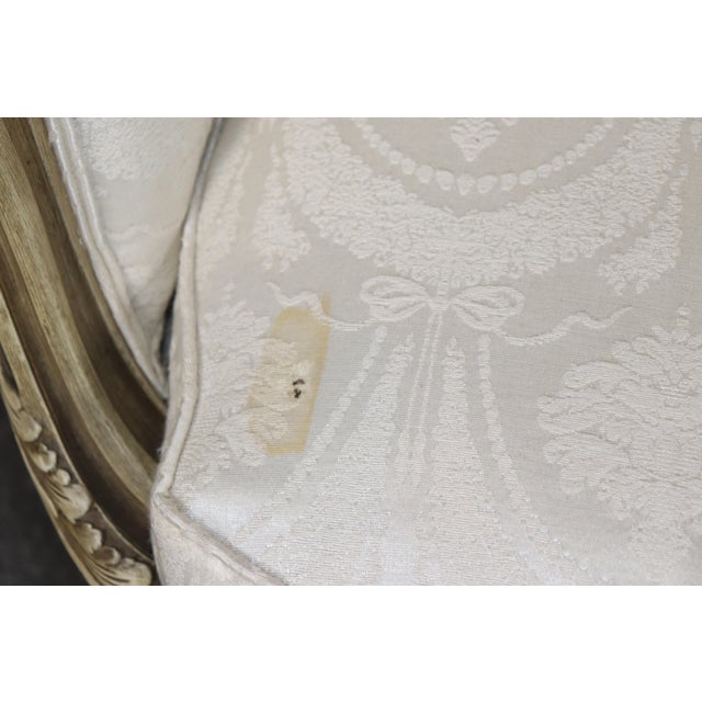 Cream French Louis XVI Creme Painted Tall Back Heavily Carved Bergere Chair For Sale - Image 8 of 12