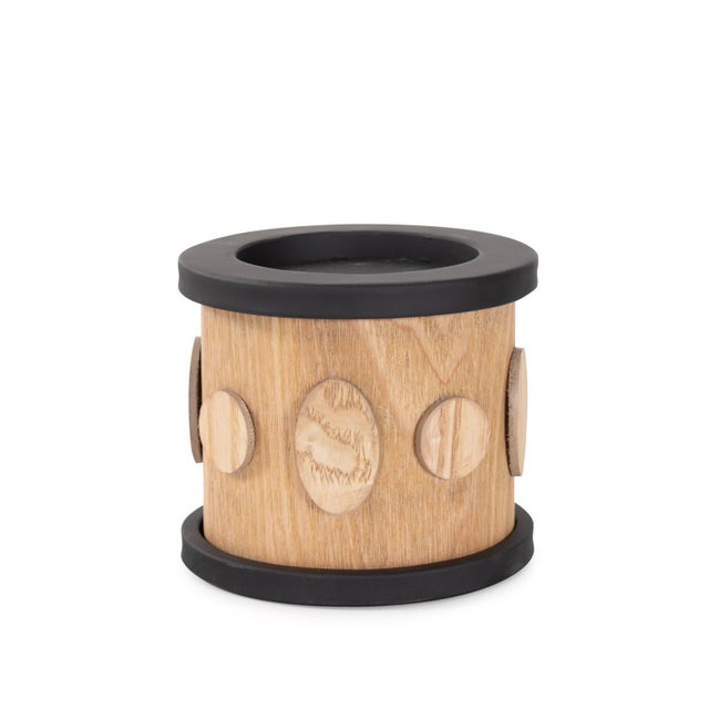 Crafted with intricate detailing, this candle holder and its rich wooden finish and matte black details it complements any...