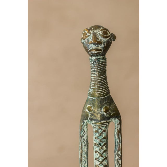 Benin bronze objects, were used in West Africa as a form of currency and thus status. Their value lies in both the metal...