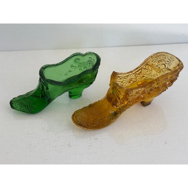 Midcentury pair of Fenton art glass shoes. Please see condition details noted. Most items found at Pub & Oasis are vintage...