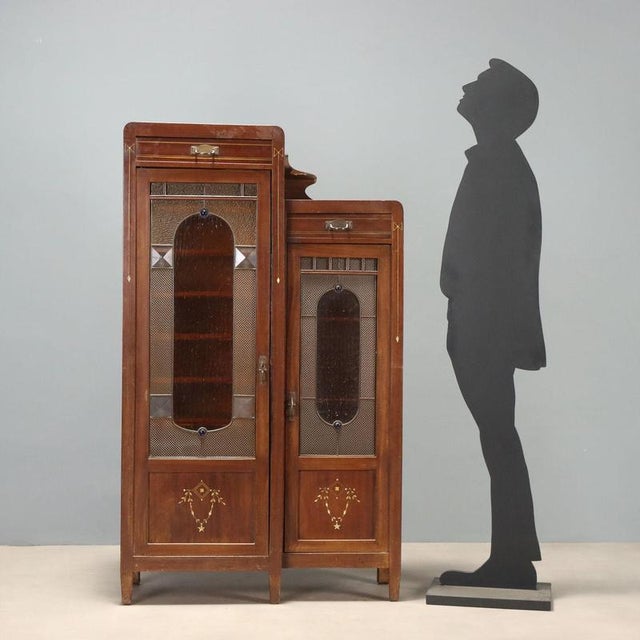 Mahogany office cabinet dating back to the late 19th century, of Italian craftsmanship. The structure features a pair of...