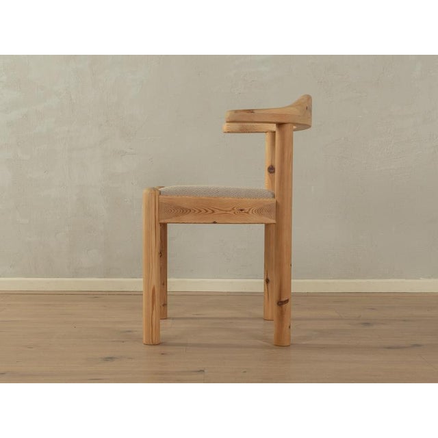 Classic dining chair from the 1960s. High-quality solid wood frame in pine. The chair has been reupholstered and covered...