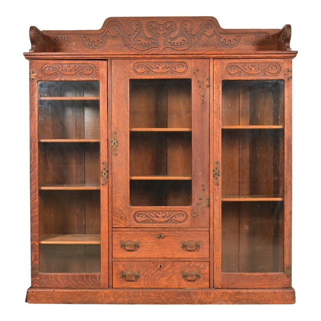 R. J. Horner Style Antique Victorian Carved Oak Triple Bookcase, Circa 1880s For Sale