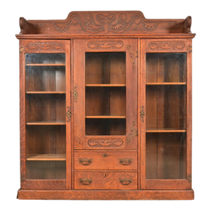 R. J. Horner Style Antique Victorian Carved Oak Triple Bookcase, Circa 1880s