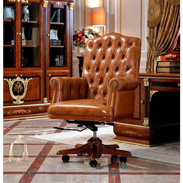Command attention with this impressive executive office chair, beautifully upholstered in rich cognac-brown leather. Deep...