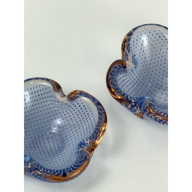This pair of Murano bullicante glass bowls was designed by Galliano Ferro for Ferro Italarts in Murano, Italy, circa...