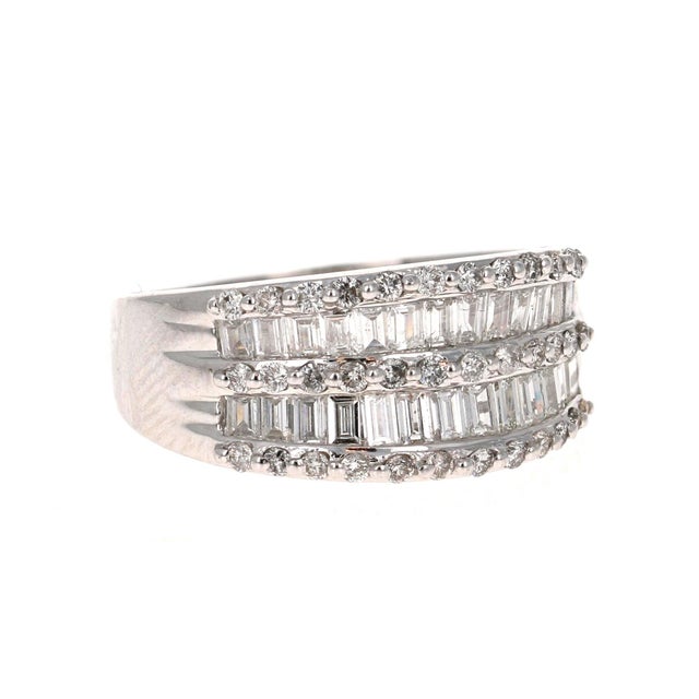 Classy Baguette and Round Cut Diamond Band This ring has 26 Baguette Cut Diamonds that weigh 1.30 Carats and is...