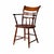 Antique Windsor armchair featuring a bamboo-style turned frame and a distinct ball-decorated bar back.