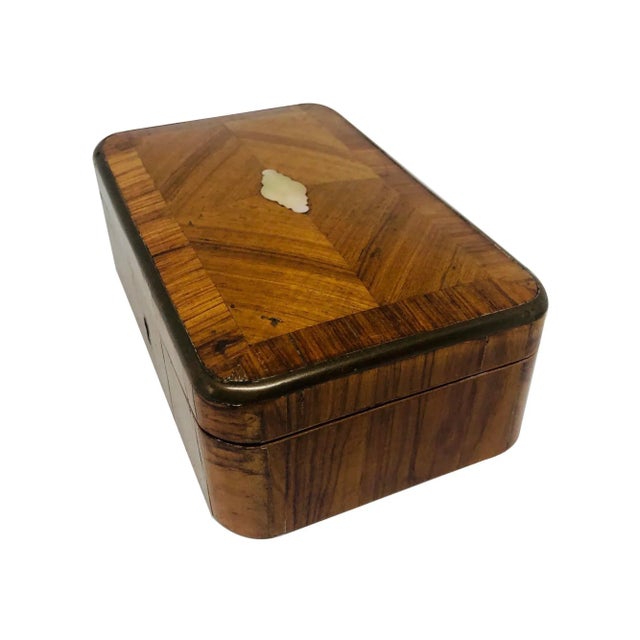 A fine French late 19th century Kingwood and brass mounted small jewel box. The box, with a rectangular top, veneered in...