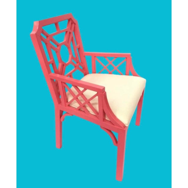 Fabulous Lilly Pulitzer Chinese Chippendale arm chairs. Featuring a vibrant pink lacquer chinoiserie Chippendale frame...