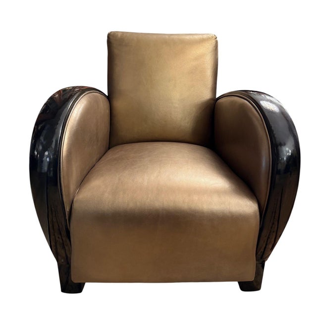 A glamorous pair of French Art Deco club chairs dating to circa 1930's. Their streamlined silhouettes combine gently...