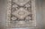 An early 20th century Persian Malayer geometric runner in browns and gray tones