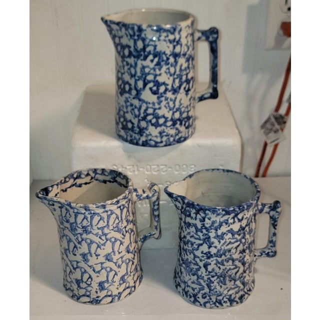 19Thc Blue & white sponge ware pottery pitchers.Sold as a group of three.