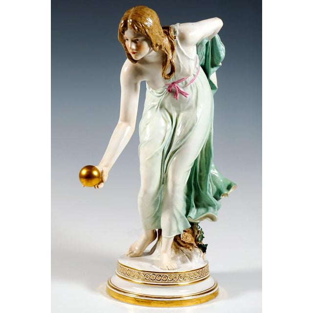 Extremely decorative, fully sculptural representation of an art nouveau beauty in a softly falling robe, tilted forward to...