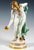 Extremely decorative, fully sculptural representation of an art nouveau beauty in a softly falling robe, tilted forward to...
