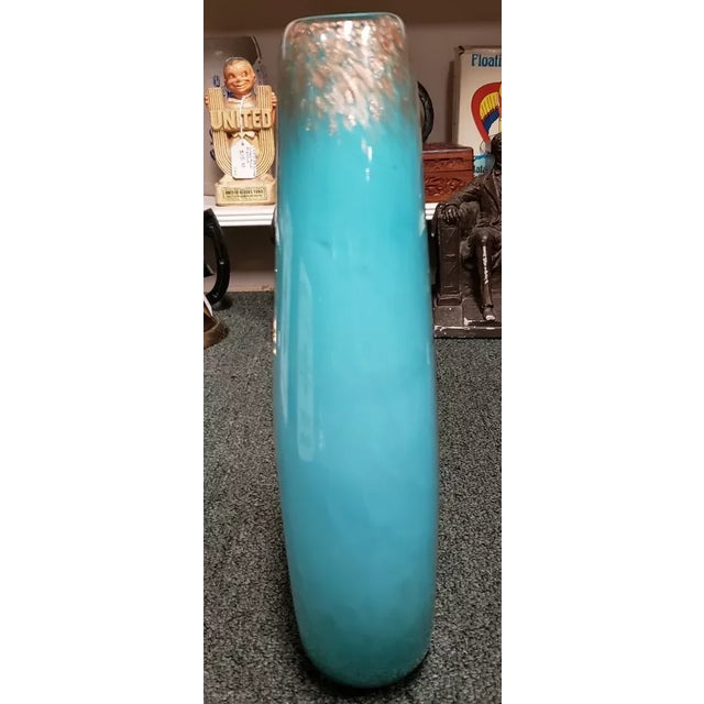 This is a 2009 Rosetree Blown Glass Fleur de Lis Motif Teardrop Vase (New Orleans). It measures 11 1/4" tall, 6 3/4" wide...