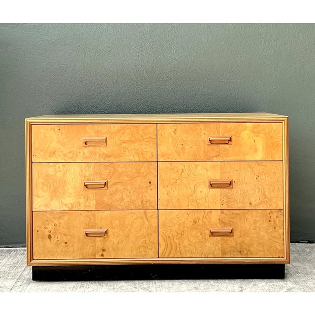 This Henredon "Scene Two" dresser captures mid-20th-century design at its most refined, pairing clean lines with the...