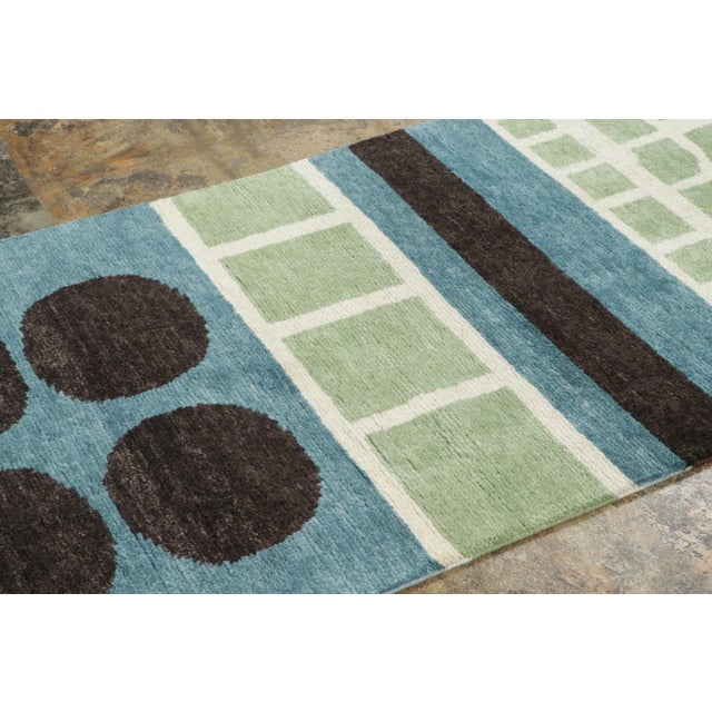 Hand-knotted in wool, this 3x10 runner is a contemporary French Deco design that celebrates bold geometry through a clean,...
