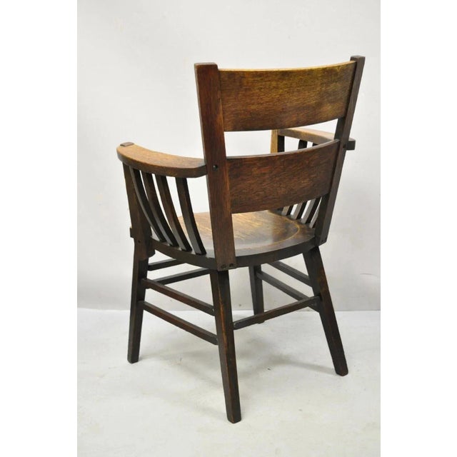 Early 20th Century Antique Arts & Crafts Mission Oak Bowed Spindle Plank Seat School Arm Chair For Sale - Image 12 of 12