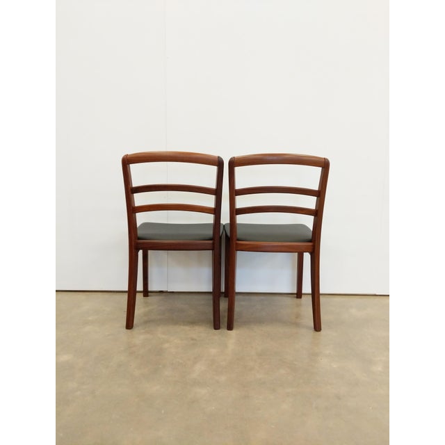 Pair of authentic vintage mid century modern dining chairs. By G Plan. Maker's label on bottoms. This set is in excellent...
