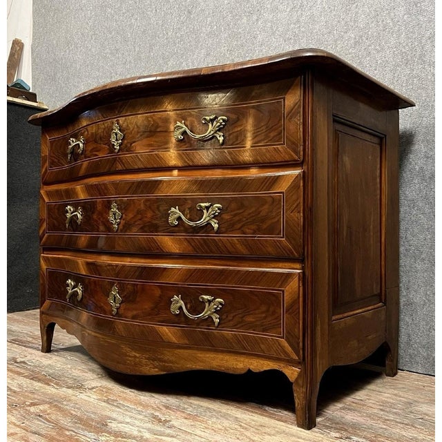 Louis xv period bombé commode in precious wood marquetry, circa 1750 front opening with three drawers with gilt bronze...