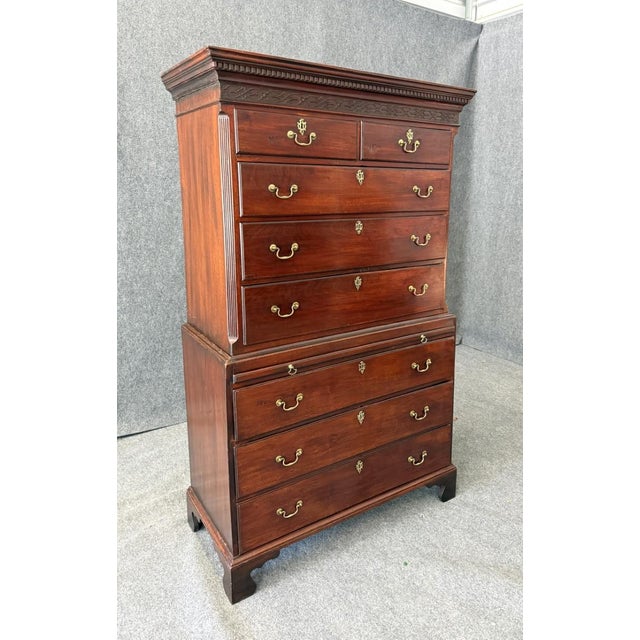 This 18th century mahogany chest on chest with dressing table showcases classic Georgian craftsmanship, featuring a...